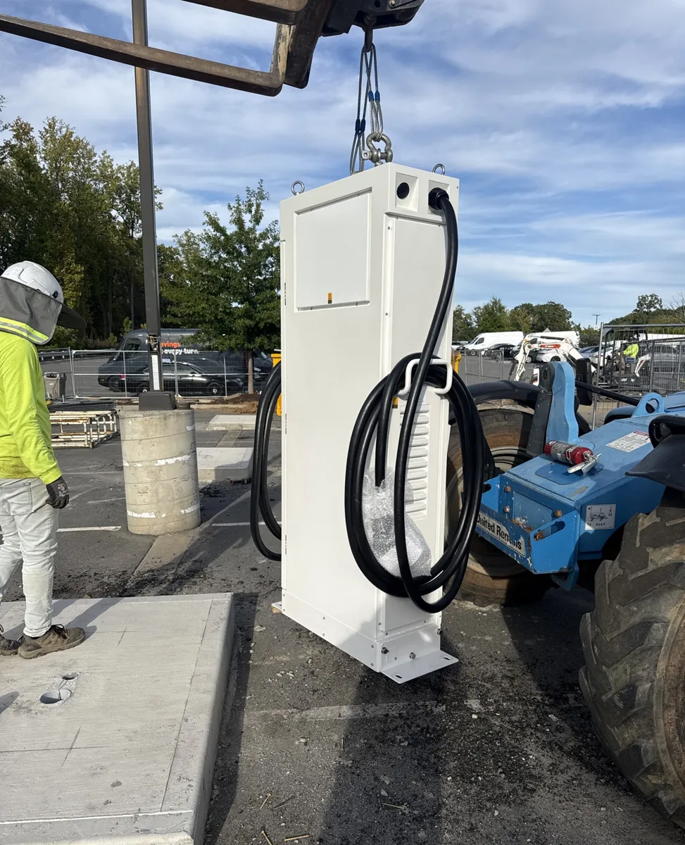 Setting a charger cabinet by crane